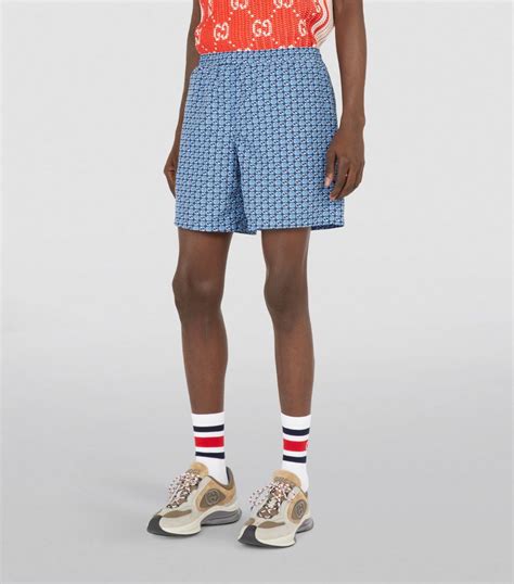 gucci interlocking swim shorts.